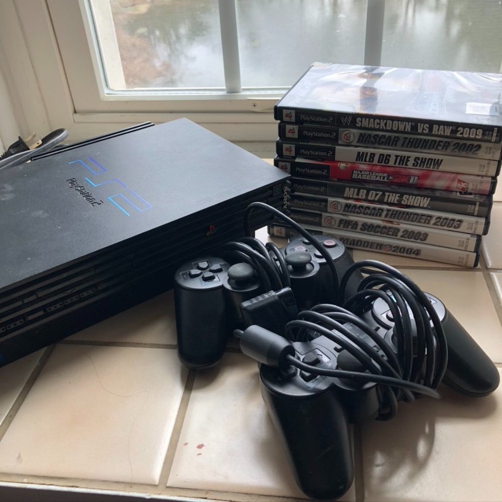 PS2 Console and 8 Game Bundle